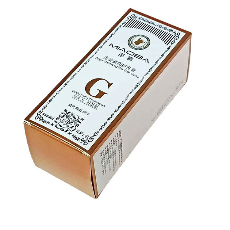 Scatola liquida di essenza abbronzante in cartoncino bianco